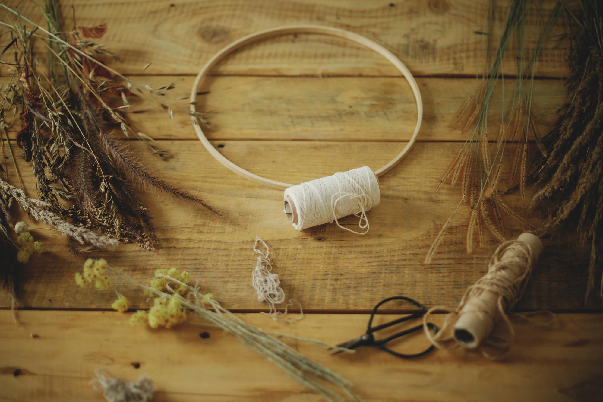 Studio workspace with threads and hoop
