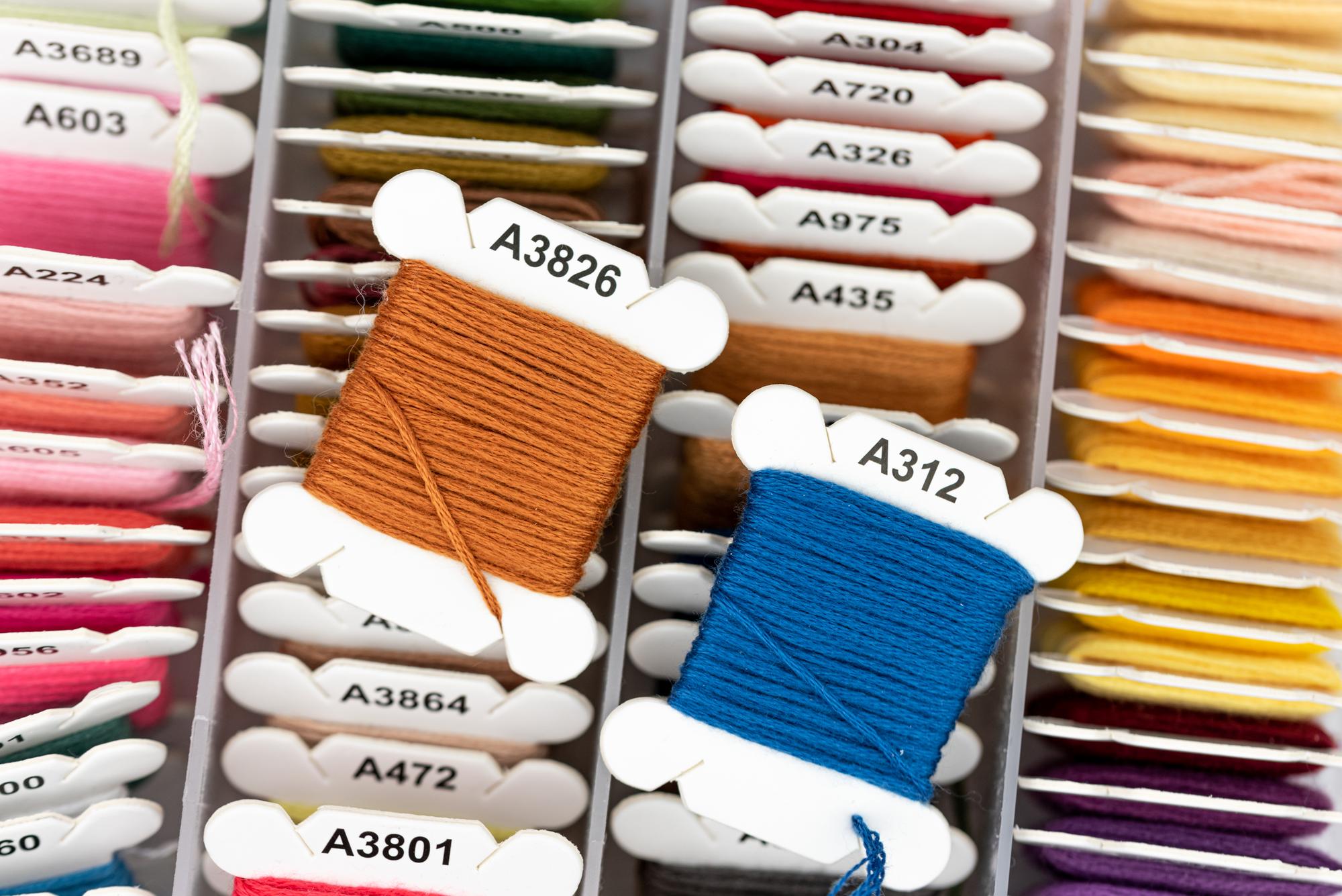 Stack of embroidered samples for subscription